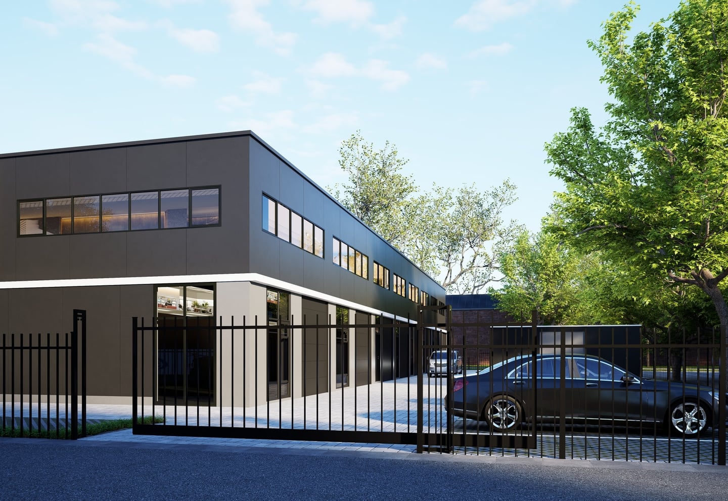 Flex-Square Kerkrade — hoekaanzicht met entree en hekwerk vanaf de straat